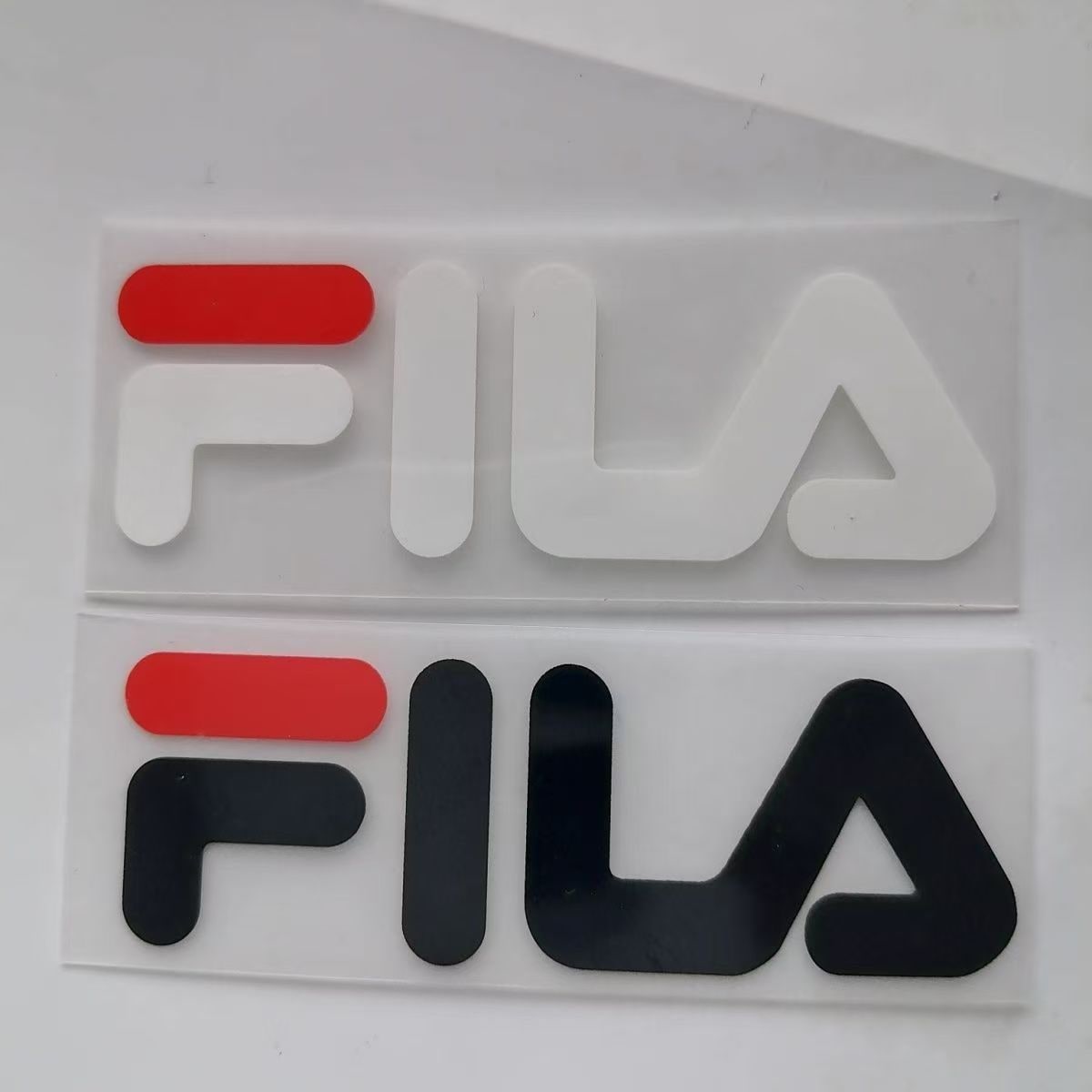 Raised FILA style 3D silicone logo sample